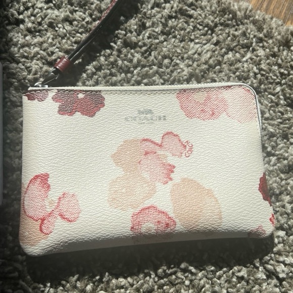 Coach Handbags - Coach Small Corner Zip Wristlet featuring a floral brushstroke design #1764